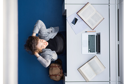 Top view of female student in, a School & Education Photo by HalfPoint