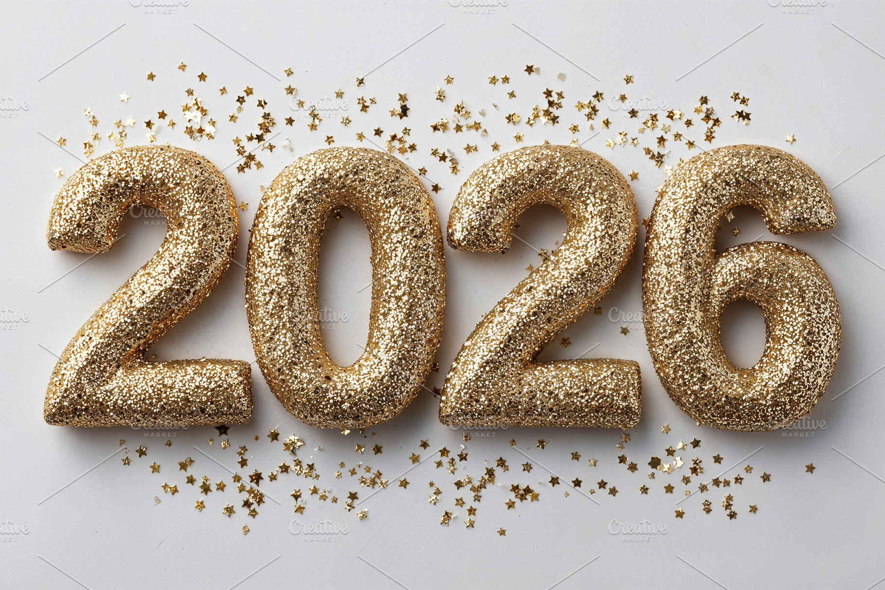 Celebrate new year 2026 with glittering decorations and stars, a Background Photo by OSORIOartist