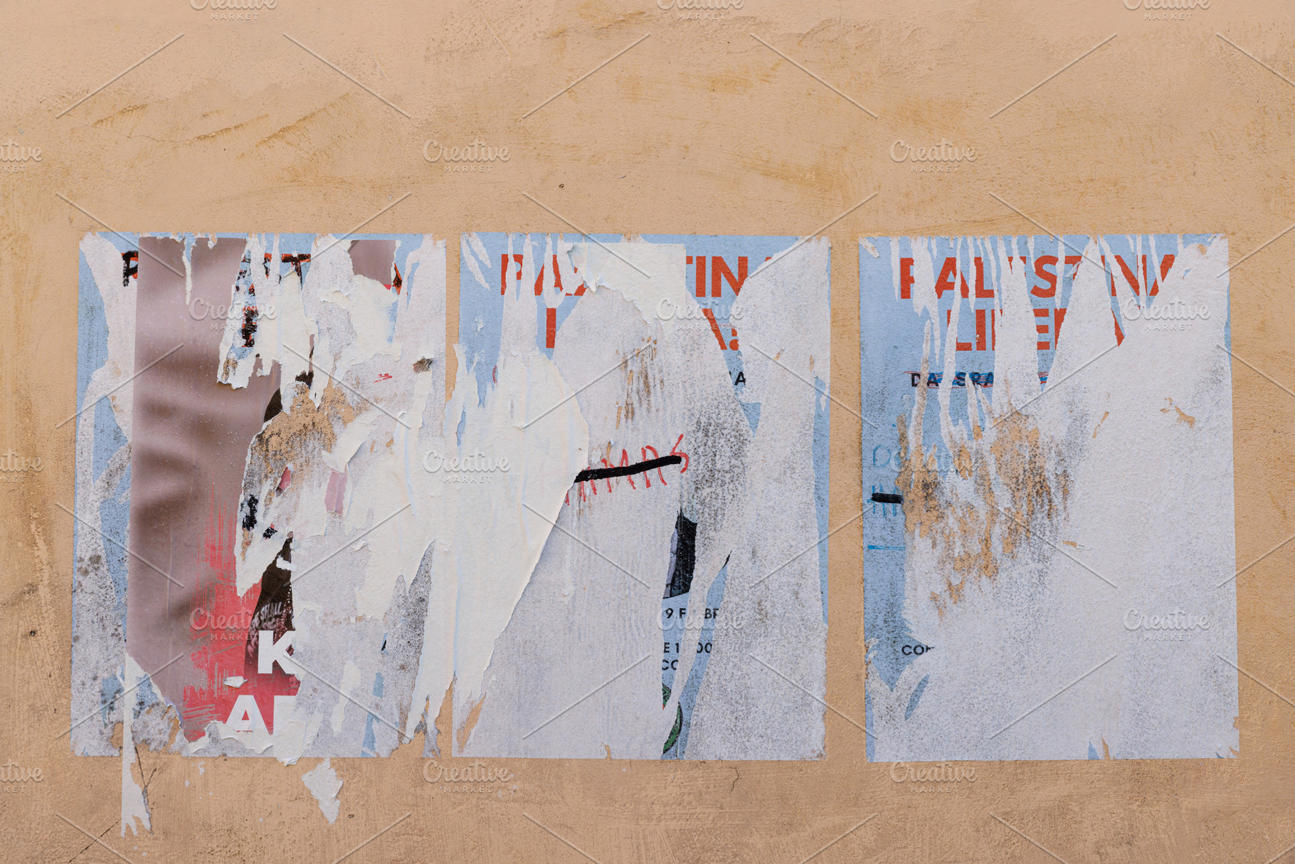 Scratched layers of posters and placards on a street wall, a Background Photo by Bepslabor