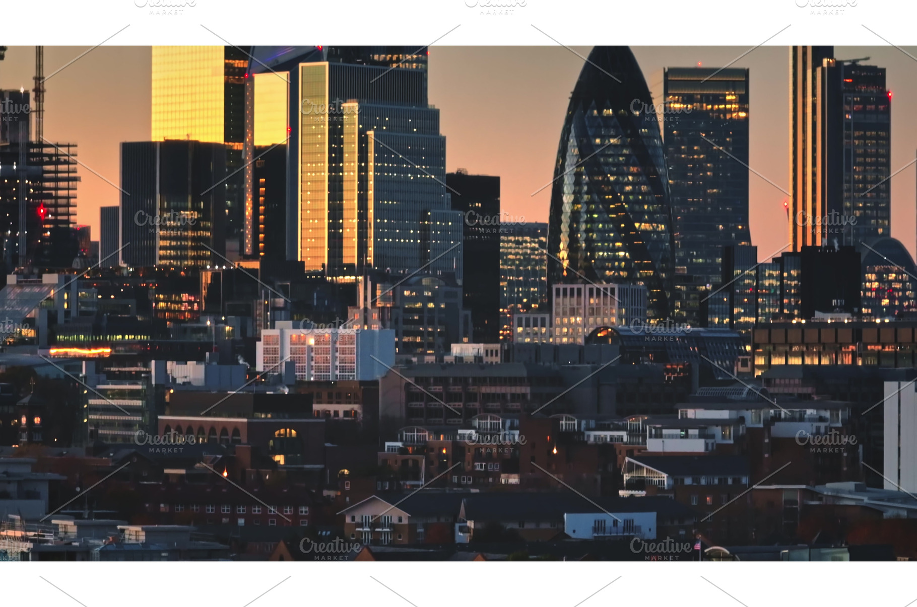 London skyline glowing at sunset, an Architecture Photo by Goinyk