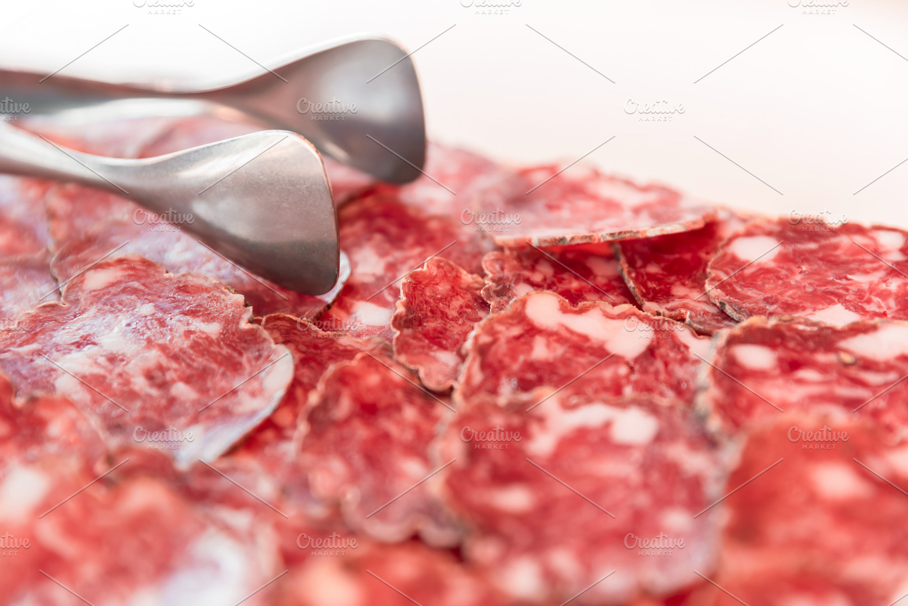 Salami slices close up, a Food & Drink Photo by KYNA STUDIO