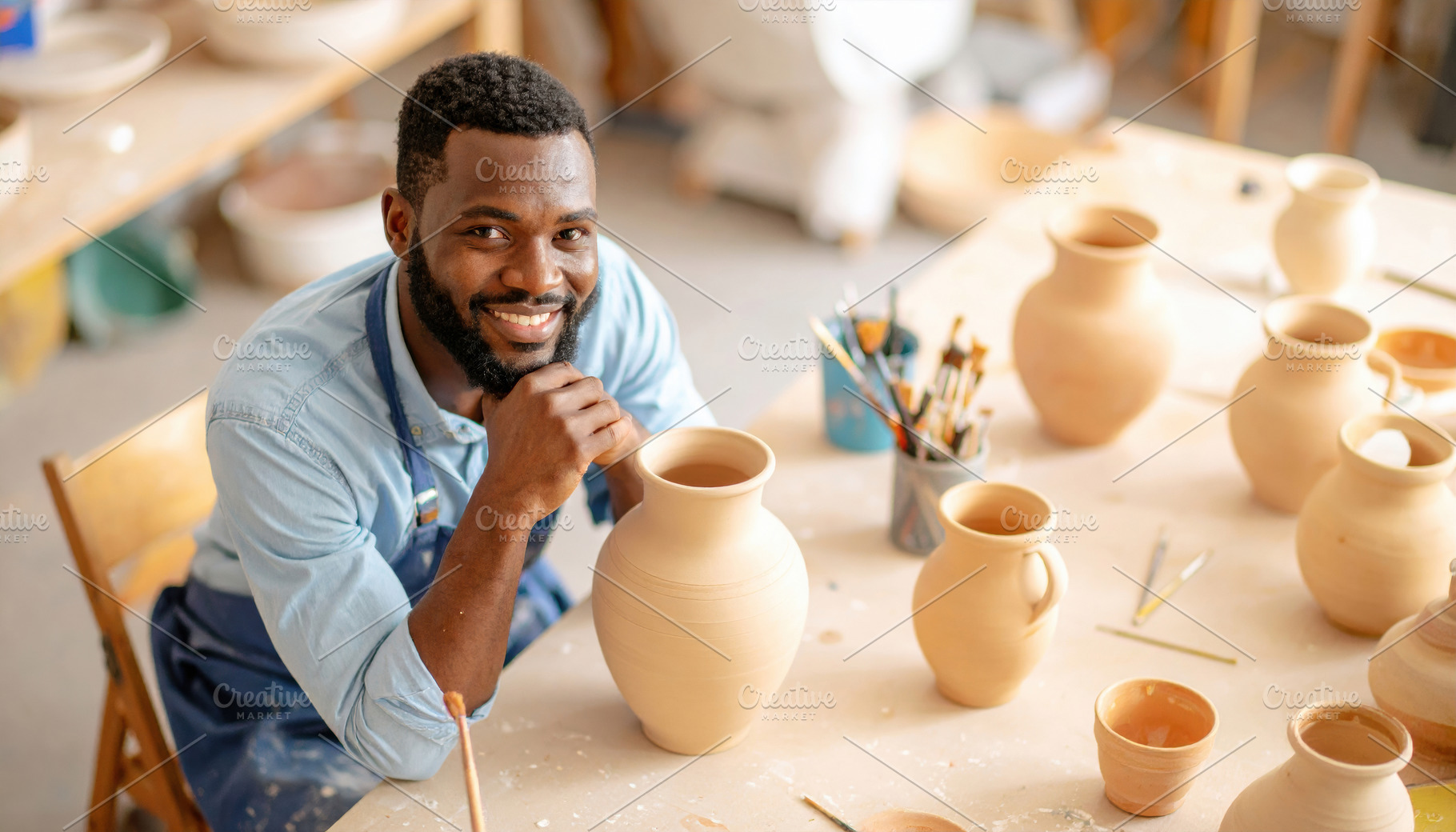 Smiling Black Male Potter with Handmade Vases, an Arts & Entertainment Photo by Davizro's Market