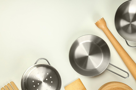 Different kitchen utensil on white background, top view, a Food & Drink Photo by AtlasStudio PRO