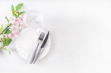 Easter holiday table setting with cutlery, a Holiday Photo by Rimma
