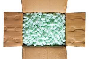 cardboard box with chips isolated over white, a Photo by WorldOfPhotos