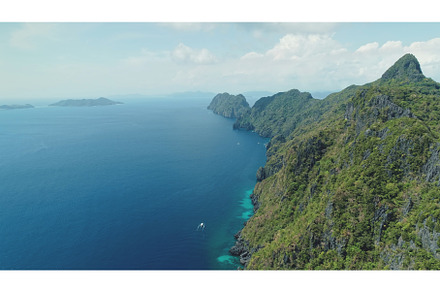 Aerial view of mountain island, a Nature Photo by Goinyk