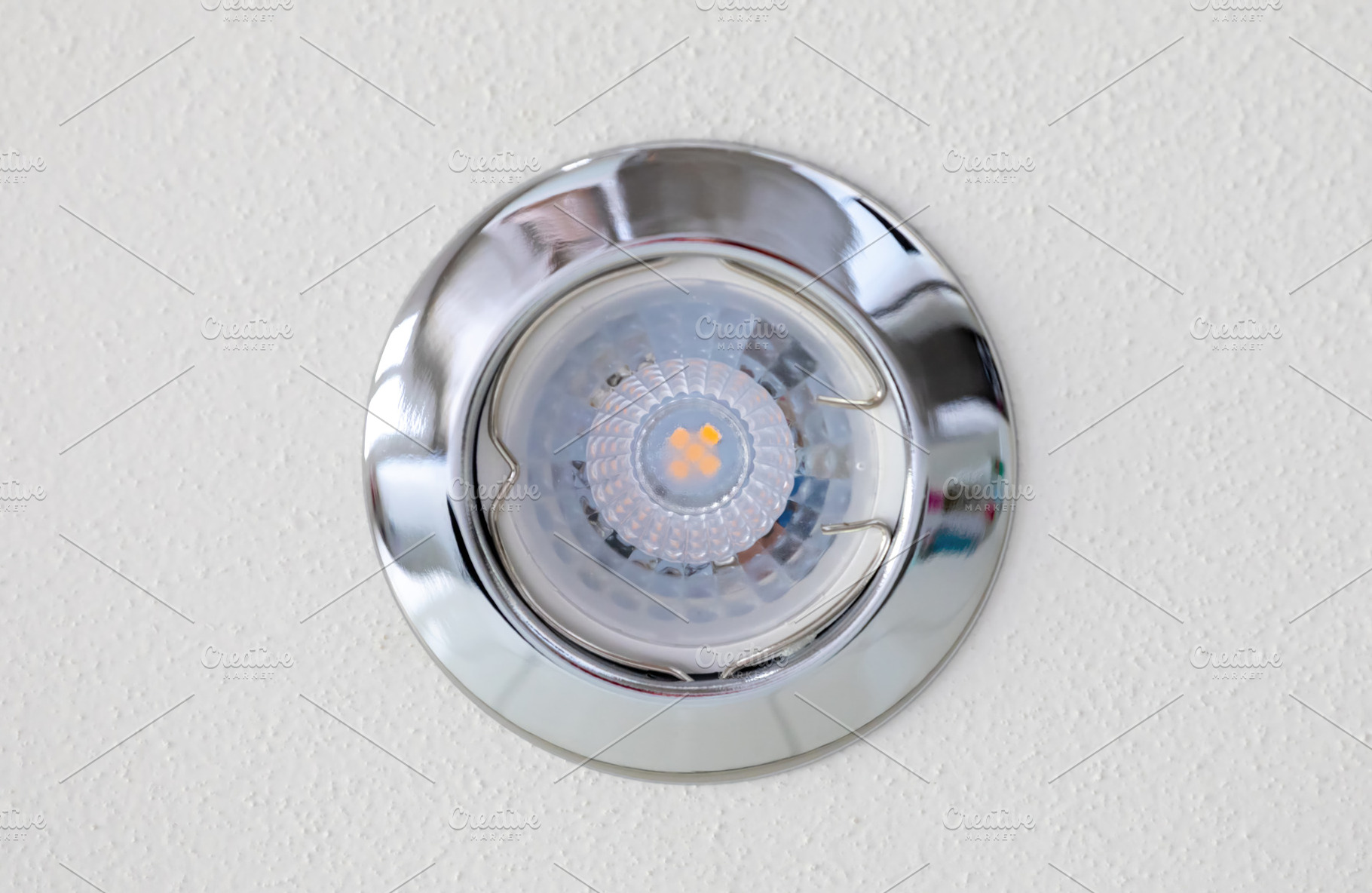 Modern led spotlight illuminating white textured ceiling, an Architecture Photo by Antonio Gravante Market
