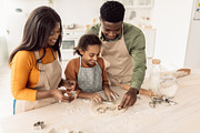 African American Family Of Three Making Salad Cooking Together Indoor, a Photo by Prostock-Studio (Thumbnail 3 of 3)