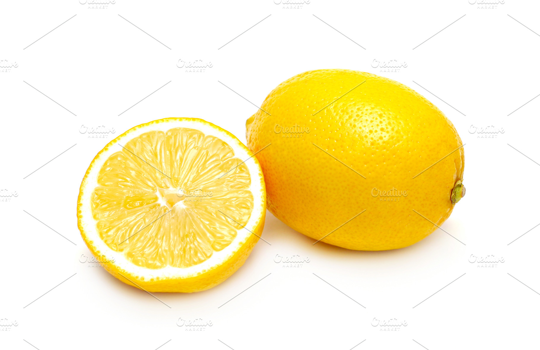 Two lemons isolated, a Photo by saiko3p