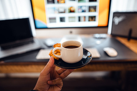 Coffee cup,hand holding a cup of coffee at the desk, a Food & Drink Photo by Art Rachen