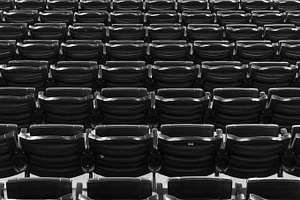 Empty seats at baseball diamond containing seats, baseball, and seattle