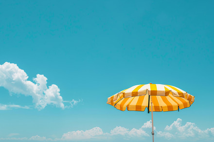 Yellow Striped Beach Umbrella Against Blue Sky, an Abstract Photo by Natalia Klenova's Shop
