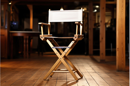 an empty directors chair awaiting, an Industrial Photo by Sergey Kotenev