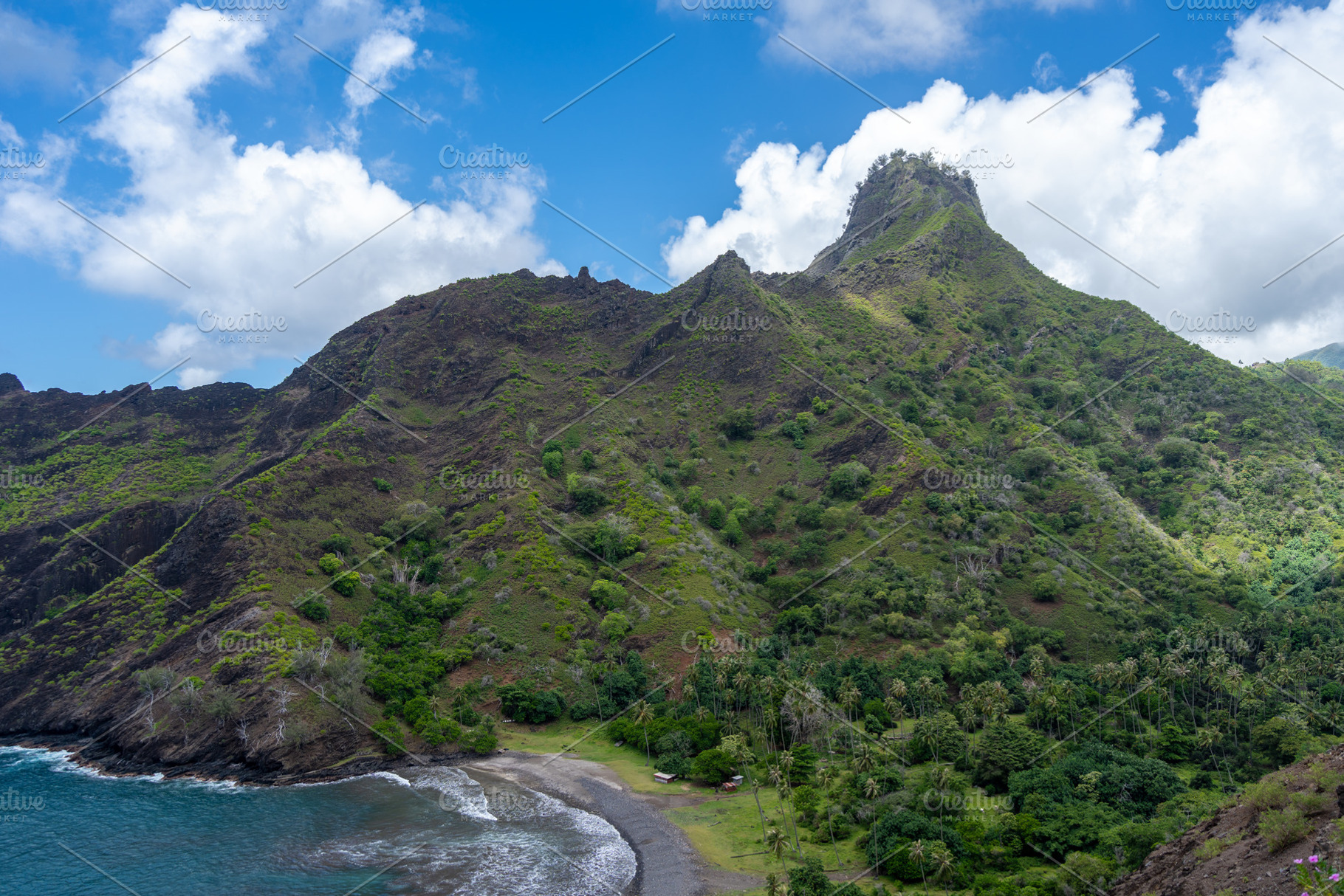 Coastal cliffs and turquoise bay near Puamau, Hiva Oa, Marquesas, a Nature Photo by GoodGoods