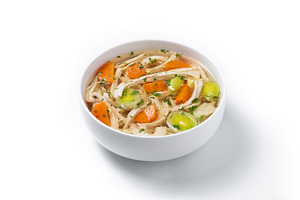 Homemade chicken soup in white bowl with carrots and celery, a Food & Drink Photo by etorres69