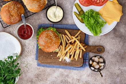 Burger with french fries and containing french, meal, and food