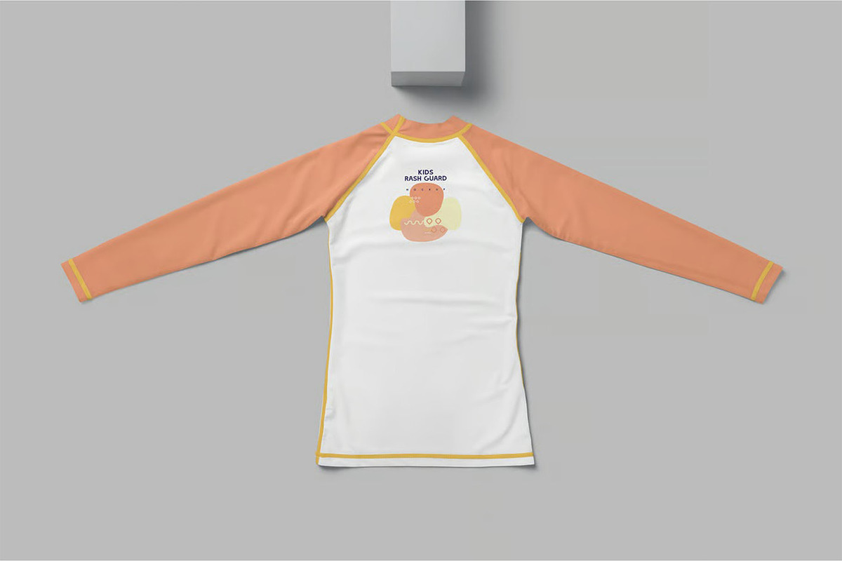 Kids Rash Guard Mockups, a Shirt Mockup by megostudi0 (Photo 5 of 7)