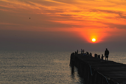 Sea at sunrise featuring sunrise, sea, and bridge, a Nature Photo by yongkiet jitwattanatam
