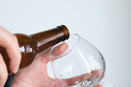 Man holding glass of beer and bottle, a Person Photo by Iuliia Pilipeichenko