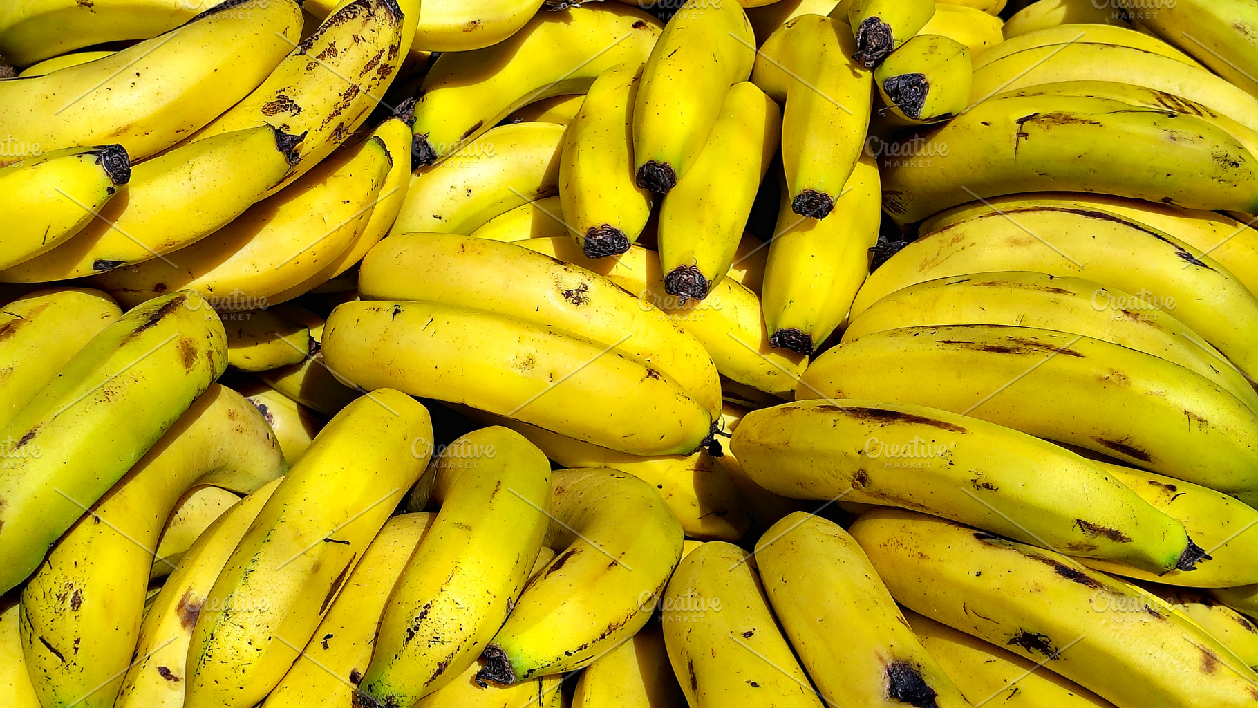 Close-up of ripe yellow bananas, a Food & Drink Photo by DanFLCreativo