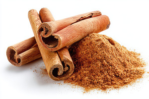 Cinnamon sticks and ground cinnamon, a Photo by Pixeness Studio