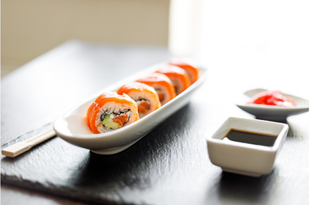 Close up image of sushi roll covered, a Food & Drink Photo by serkum