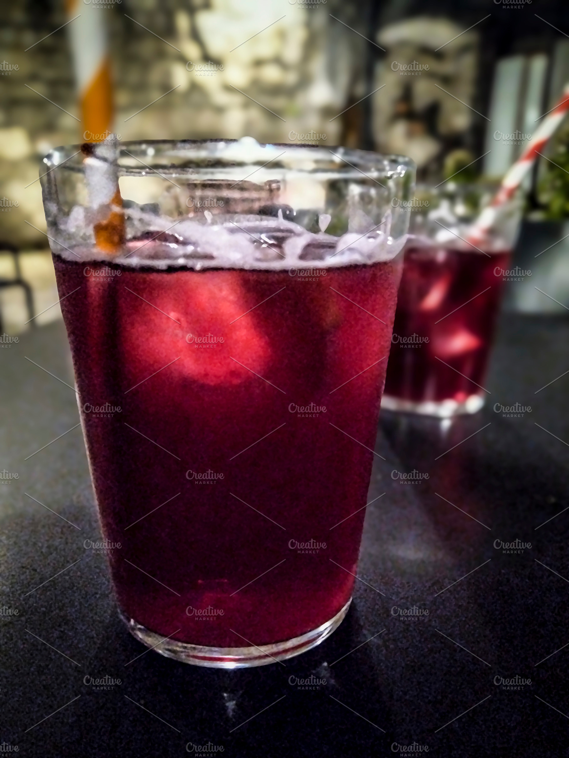 Glass of red beverage, an Architecture Photo by DanFLCreativo
