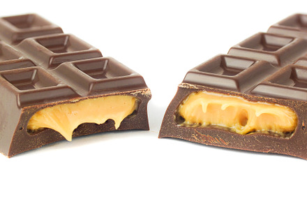 Chocolate bar isolated on white back, a Food & Drink Photo by AlexBush