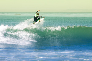 Taking off stock photo containing surfing and surfer
