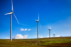 Windmills on green meadow spain stock photo containing alternative and