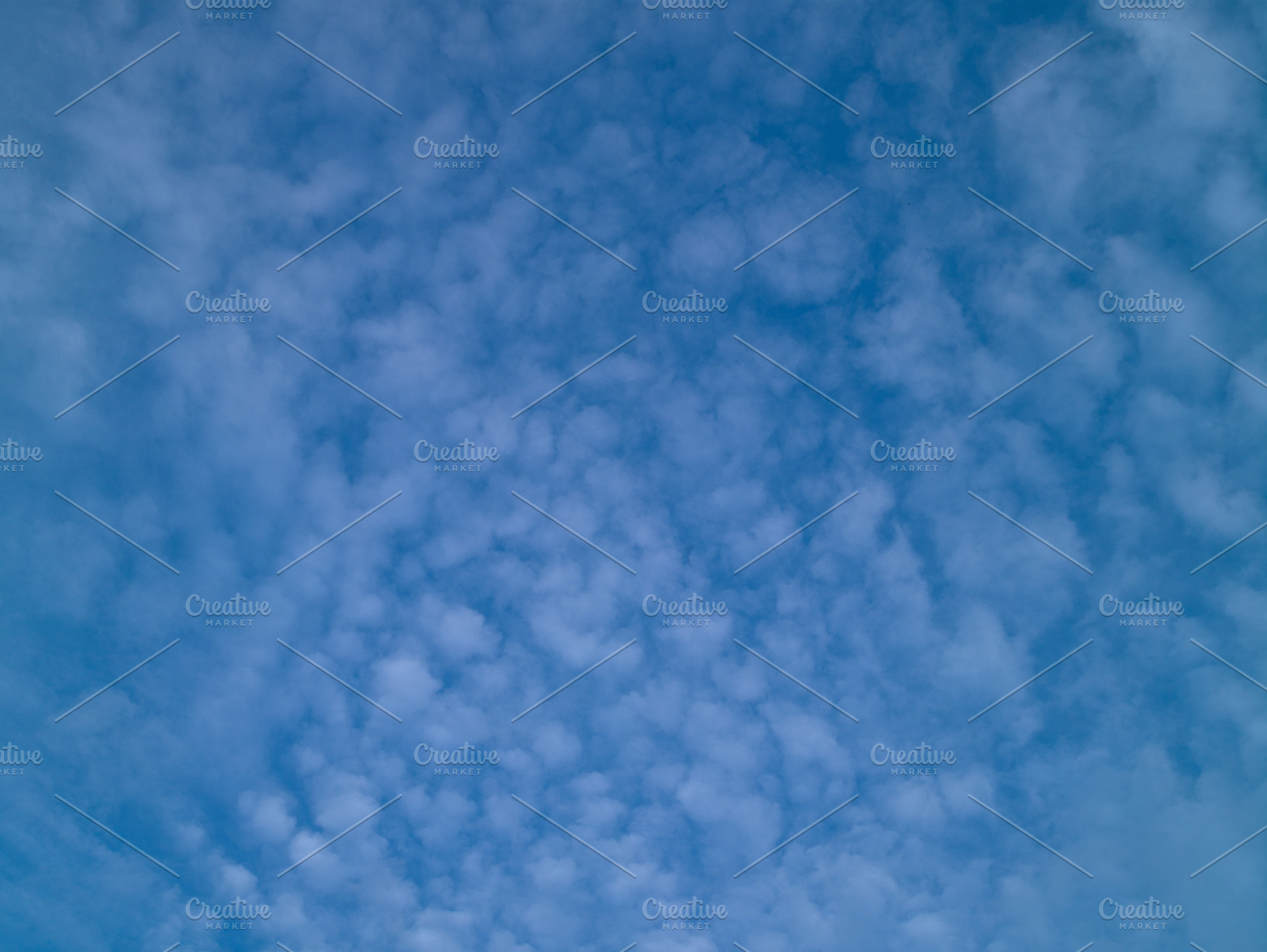 Summer blue sky with white light clo featuring cloud, blue, and white, an Abstract Photo by oleghz
