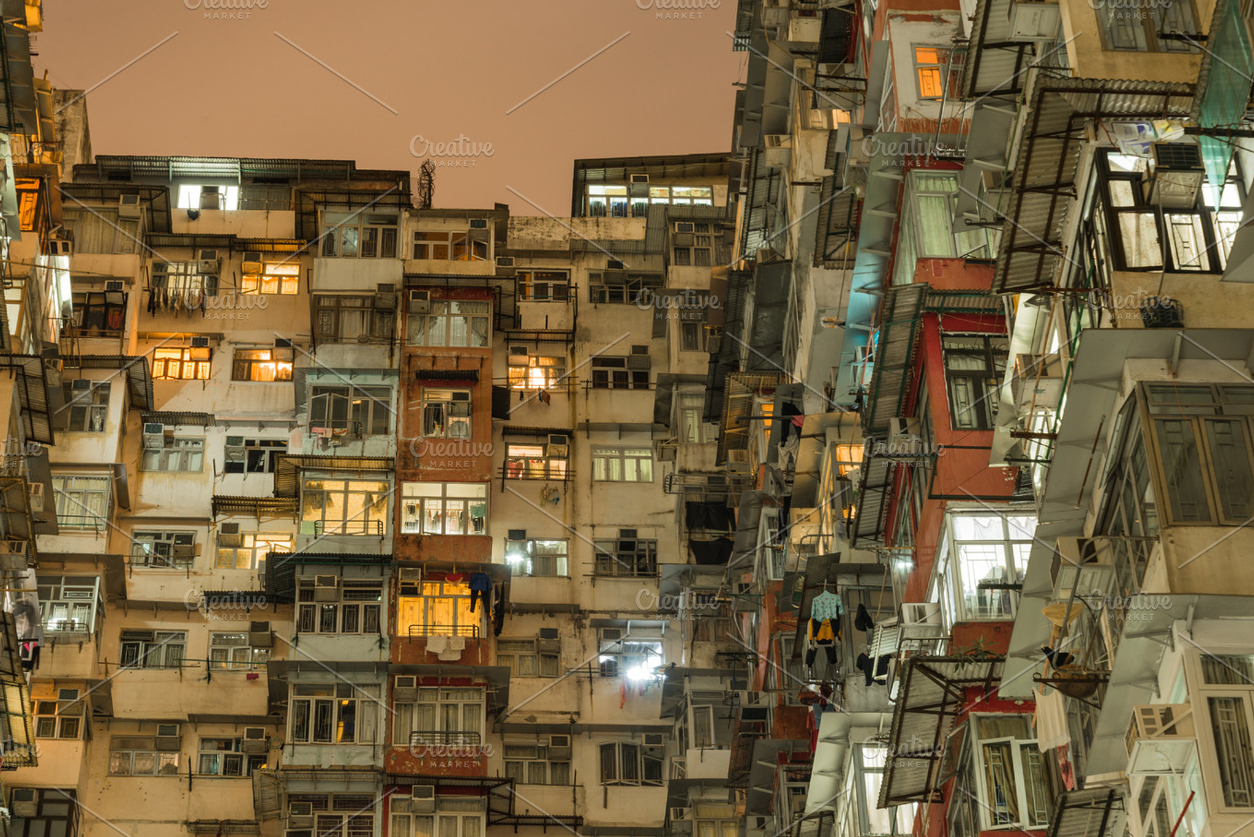 Flats in a district of hong kong containing asia, blurry, and building, an Architecture Photo by harodominguez