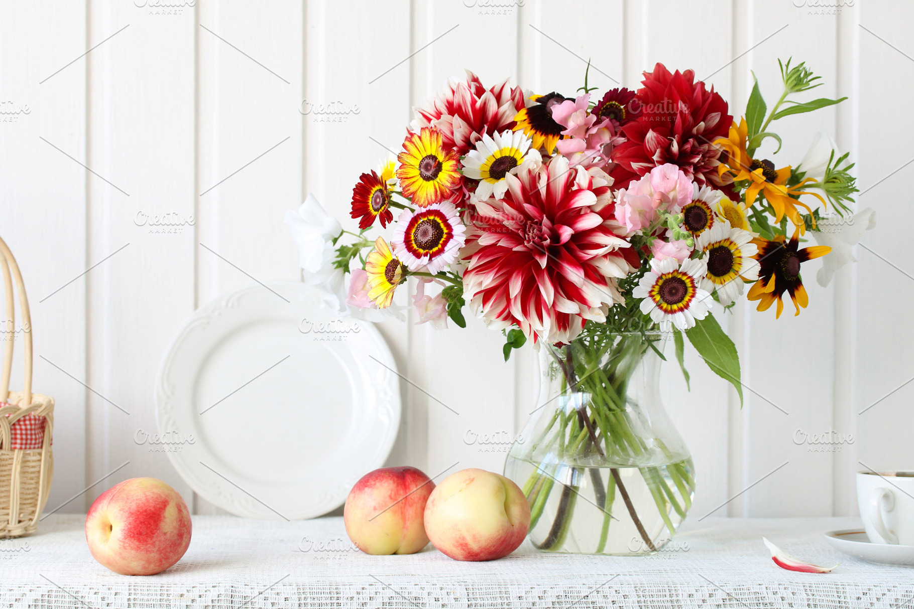 Garden flowers in a glass vase, a Photo by BalaguR