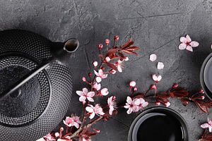 Japanese Tea Set with Cherry Blossoms on Dark Stone Background, a Food & Drink Photo by Natalia Klenova's Shop