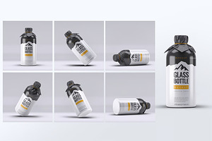Glass Bottle Wrapped Paper Mock-Up, a Product Mockup by DesignRushMarket