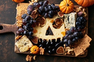Halloween charcuterie board with spooky cheese face, a Food & Drink Photo by José Manuel Gelpi