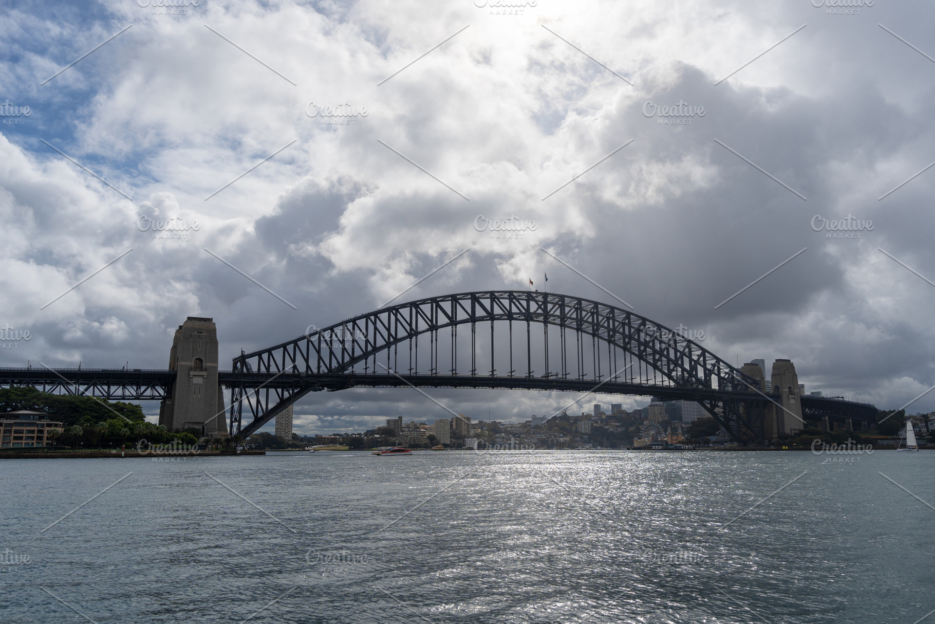Sydney Harbour Bridge over the water in Sydney, Australia, an Architecture Photo by GoodGoods