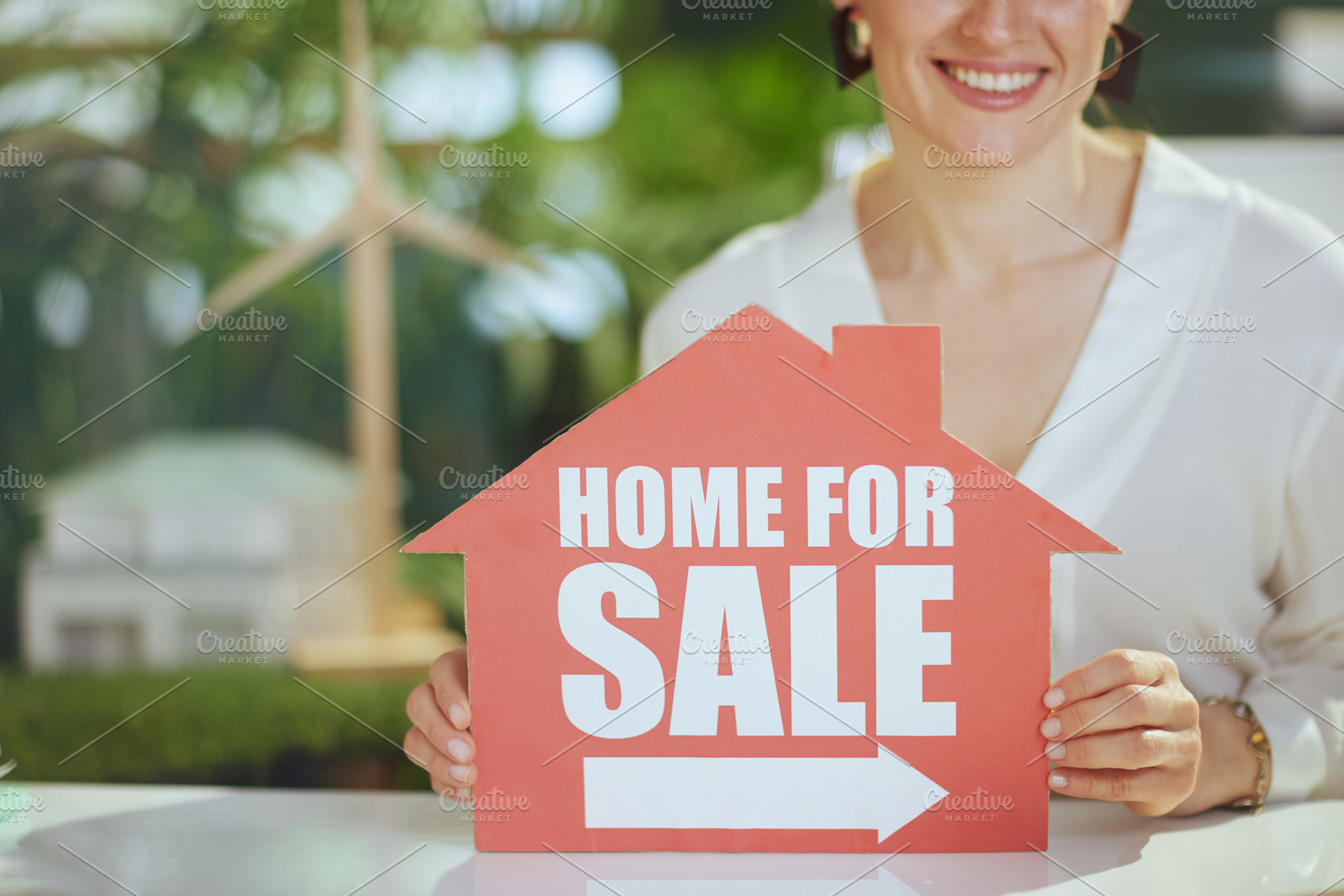 Closeup on smiling business woman in green office, a Business Photo by Alliance Images