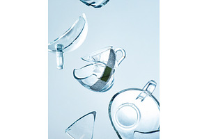 Broken cup with a bandage, fragility