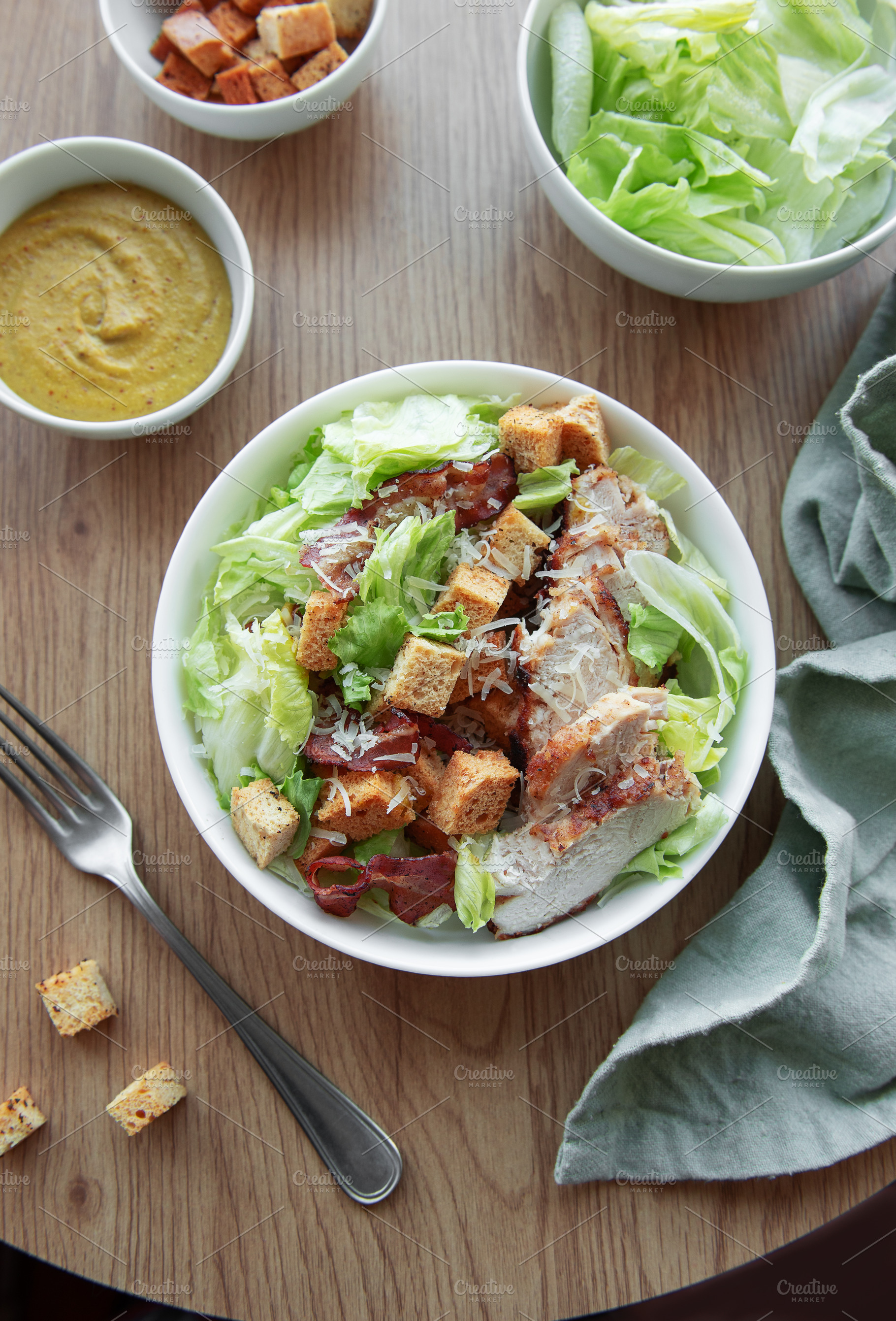 A bowl  of  Caesar salad, a Photo by Olena Rudo