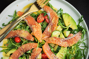 Salad with salted salmon and arugula, a Food & Drink Photo by Budarinphoto
