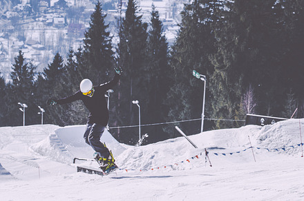 Snowboard containing snow, winter, and mountains