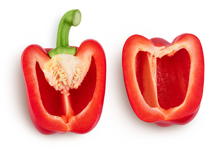 red sweet bell pepper half isolated, a Food & Drink Photo by NataPhoto