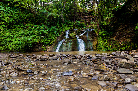 Forest waterfalls in the mountains, a Nature Photo by Photostock