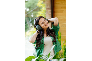 Relaxed woman enjoying free time, a Person Photo by HalfPoint