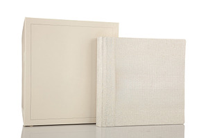Elegant white wedding photo album and its box reflecting on a white background, an Abstract Photo by Antonio Gravante Market