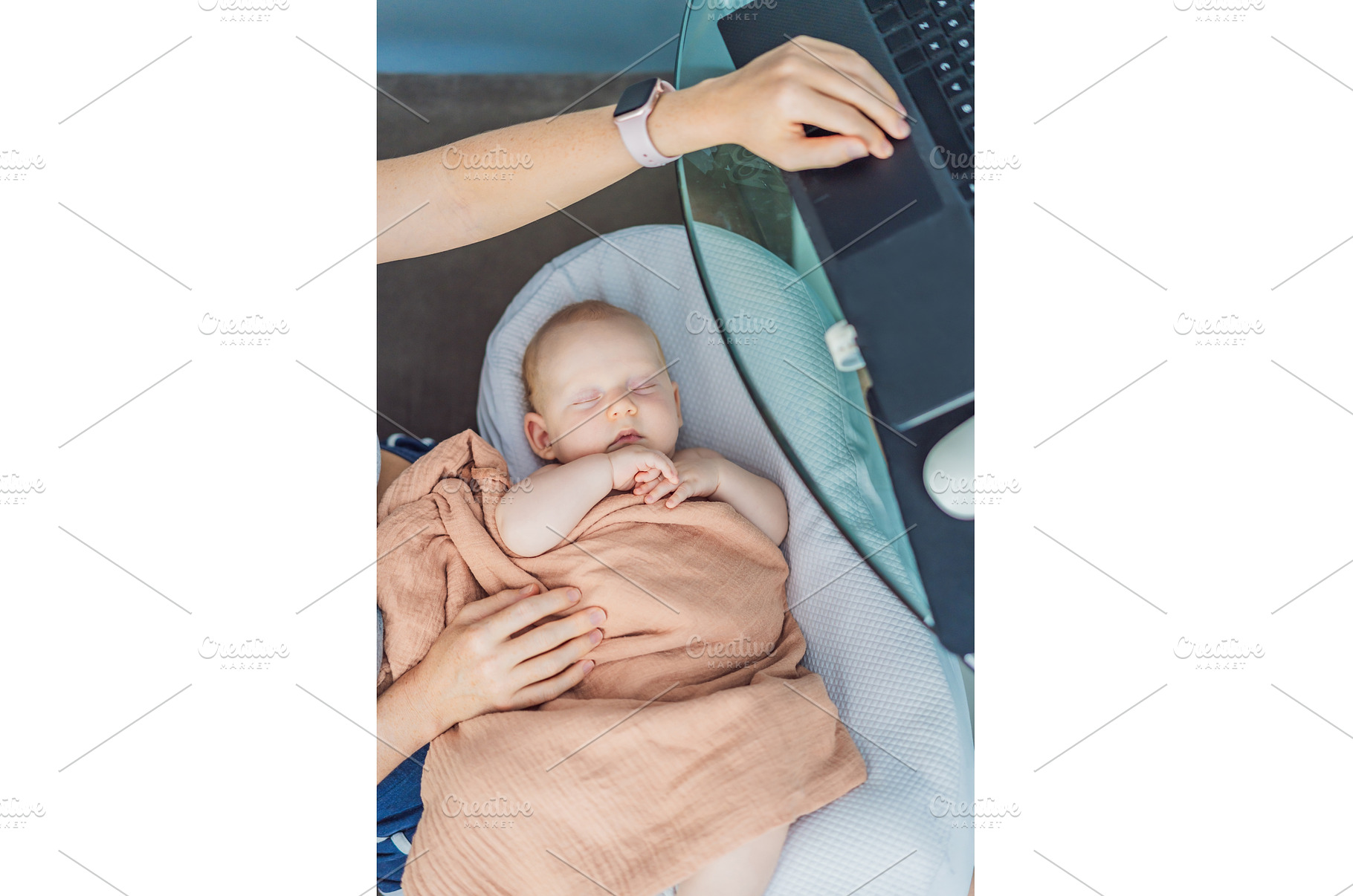 Multitasking mom works on a laptop, a Person Photo by Elizaveta Galitskaya