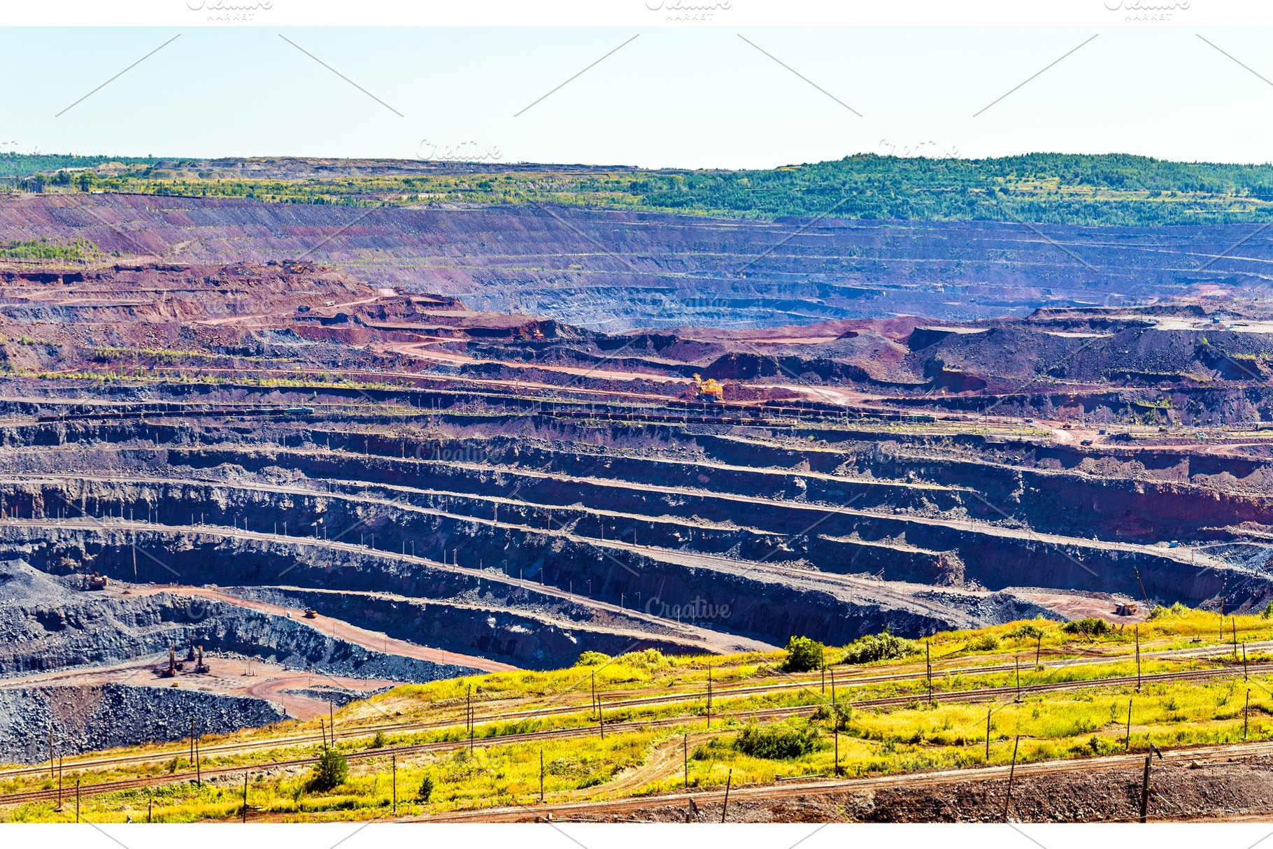 Iron ore mining in mikhailovsky field within kursk magnetic anom featuring, an Industrial Photo by Leonid Andronov