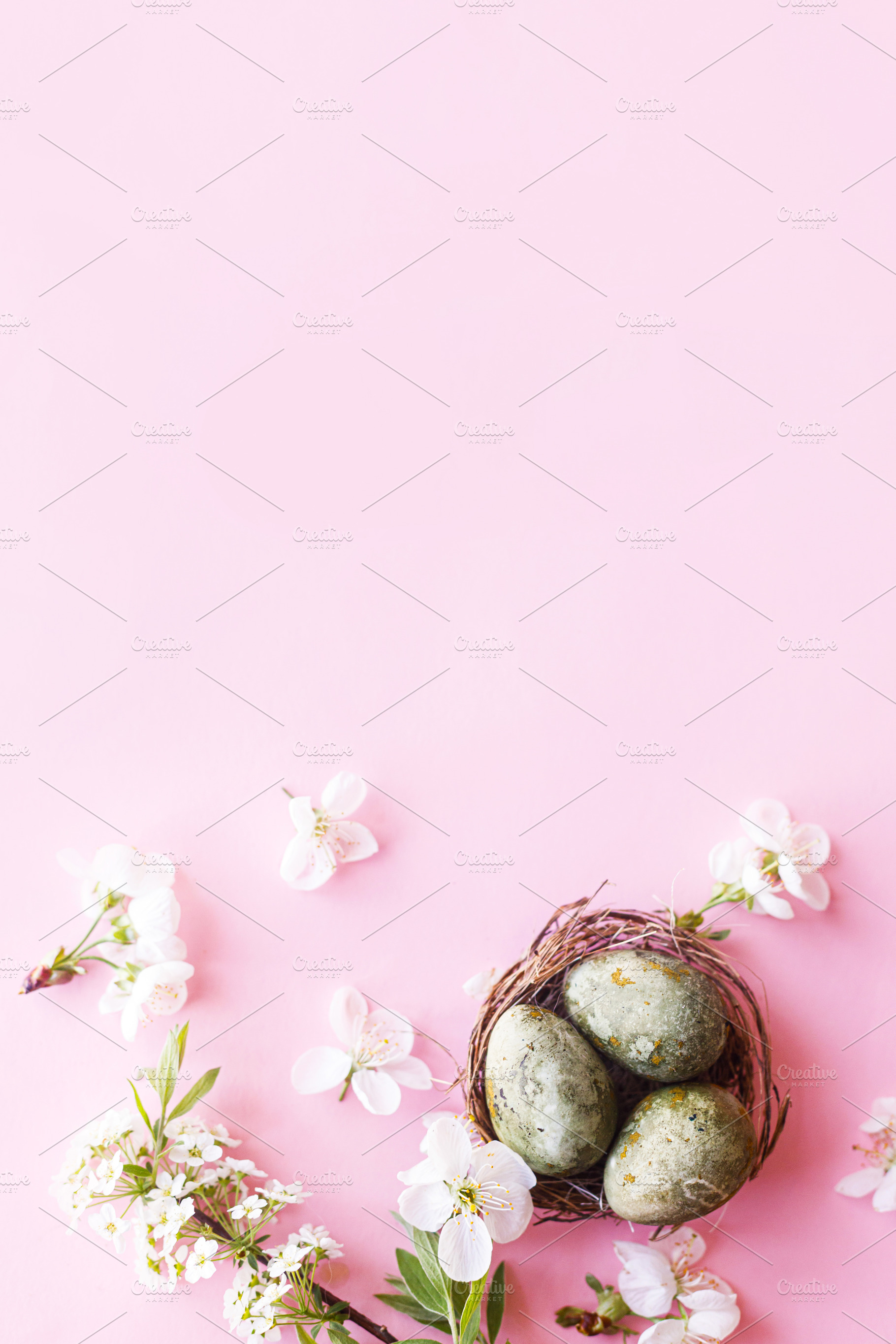 Happy Easter! Easter eggs in nest with cherry blossom flat lay o, a Holiday Photo by Sonjachni