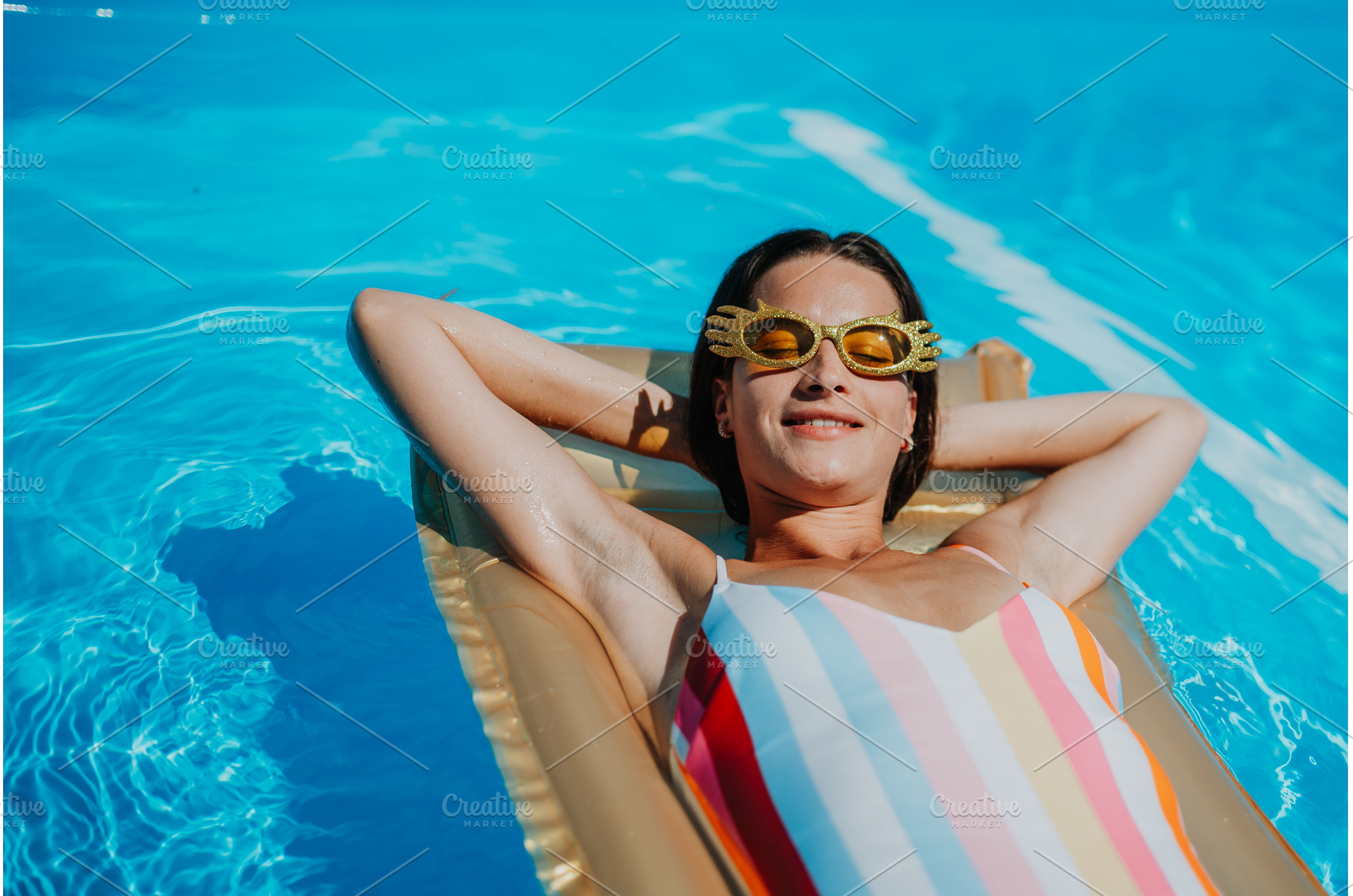 Top view of young woman in swimming, a Person Photo by HalfPoint